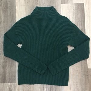 Emerald green ribbed sweater.